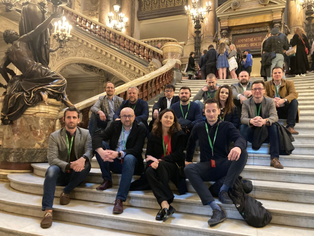 EMBA participants sitting on the stairs at Opera Garnier